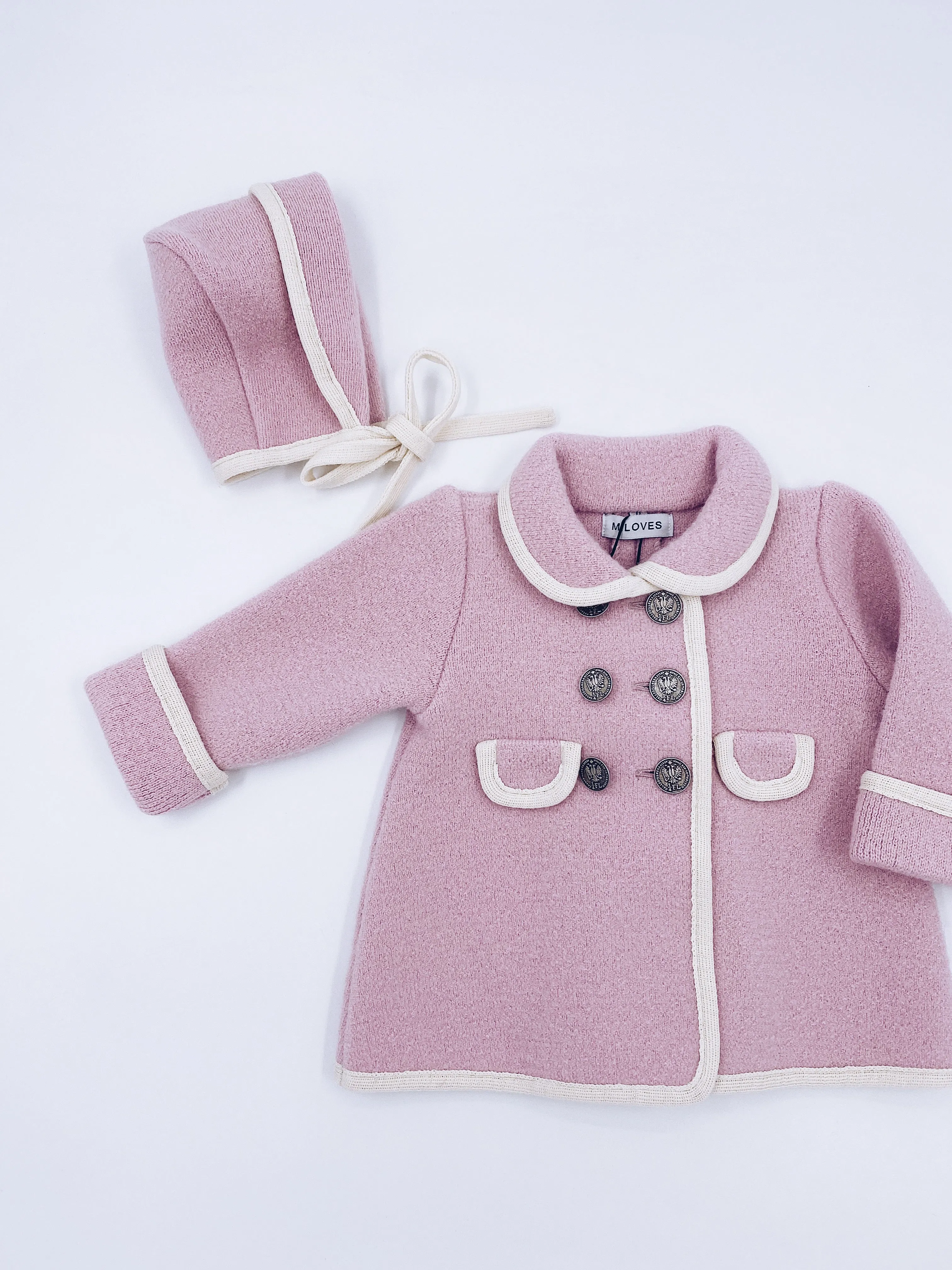 Beautiful pink merino wool coat with cream details